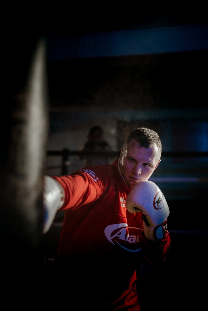 boxer practising with boxing gloves