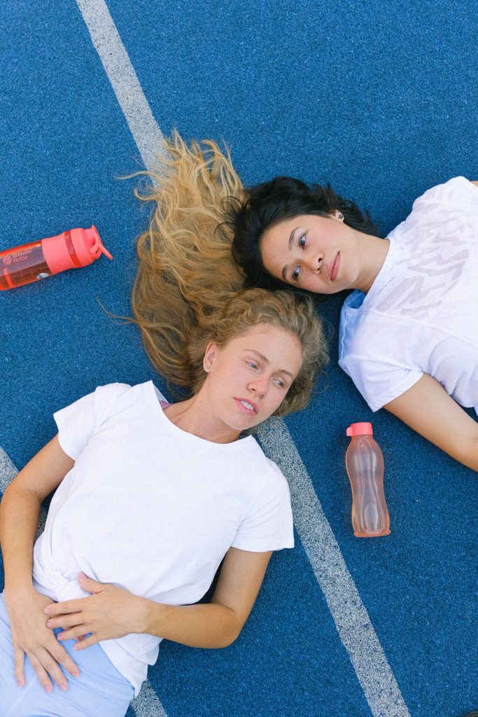 two players lying on the floor